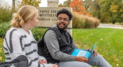 Two student studying on campus